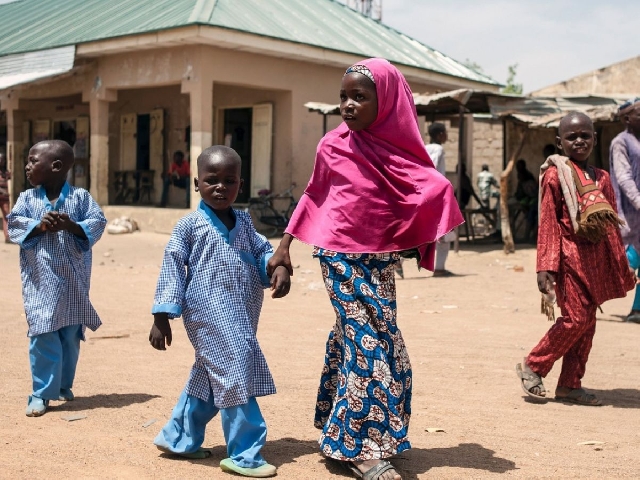 Cameroon children walking to school